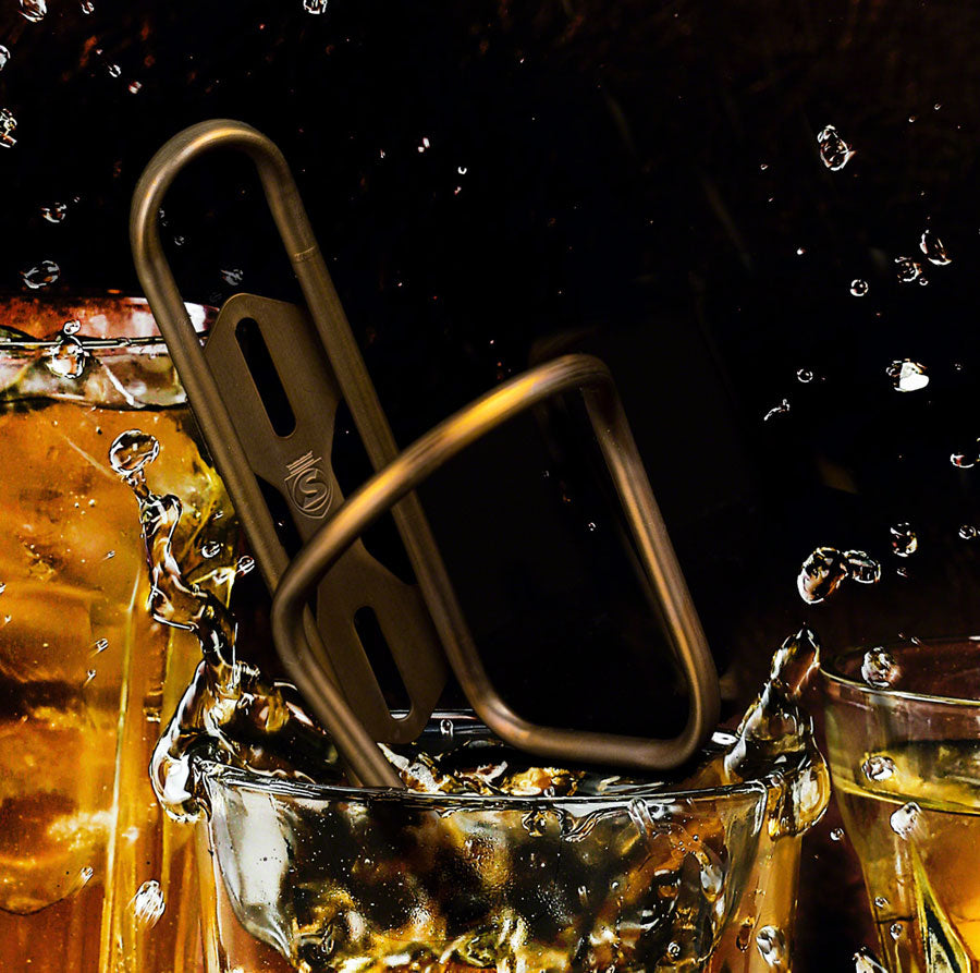 silca-anodized-titanium-bottle-cage-bourbon